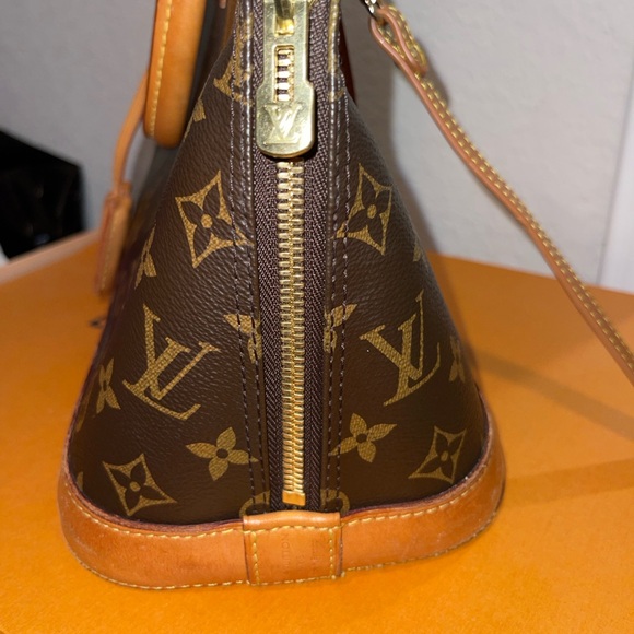 Louis Vuitton Alma PM Bag - Picture 14 of 14